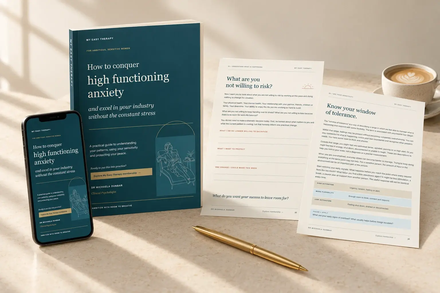 The high functioning anxiety guide shown as a workbook, on a phone and as printed pages beside a coffee and pen