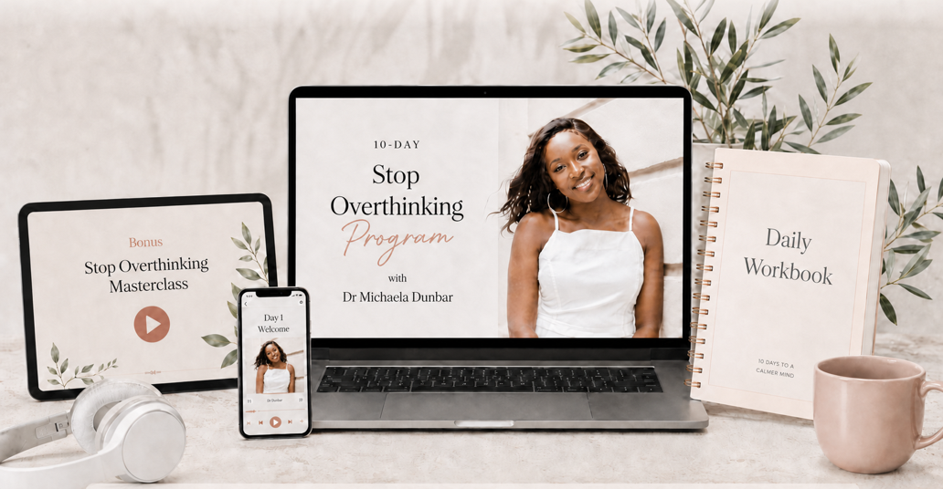 The 10-Day Stop Overthinking Challenge displayed on a laptop, tablet and phone beside the daily workbook
